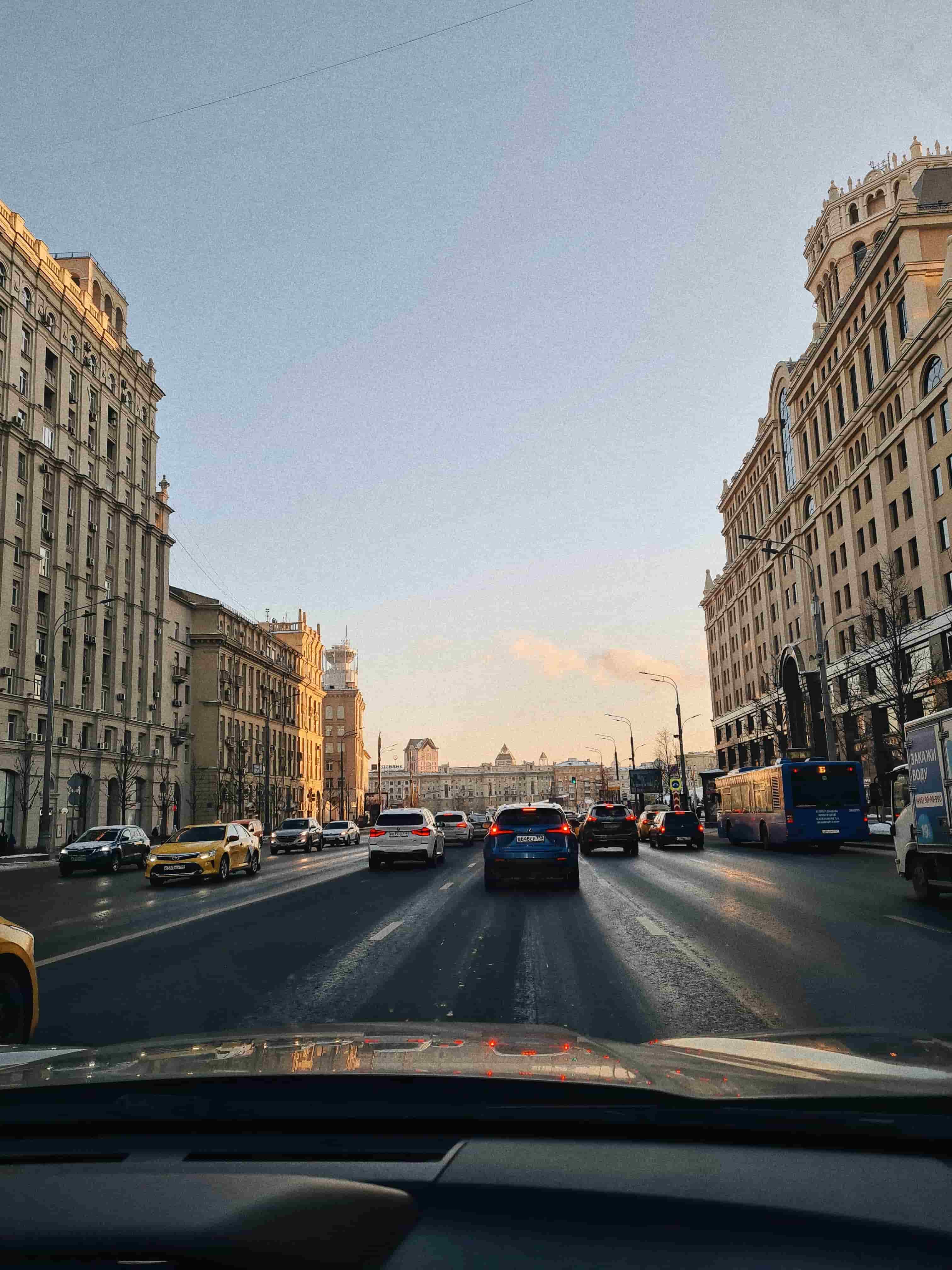 Car driving on a downtown city street in Dallas, Texas