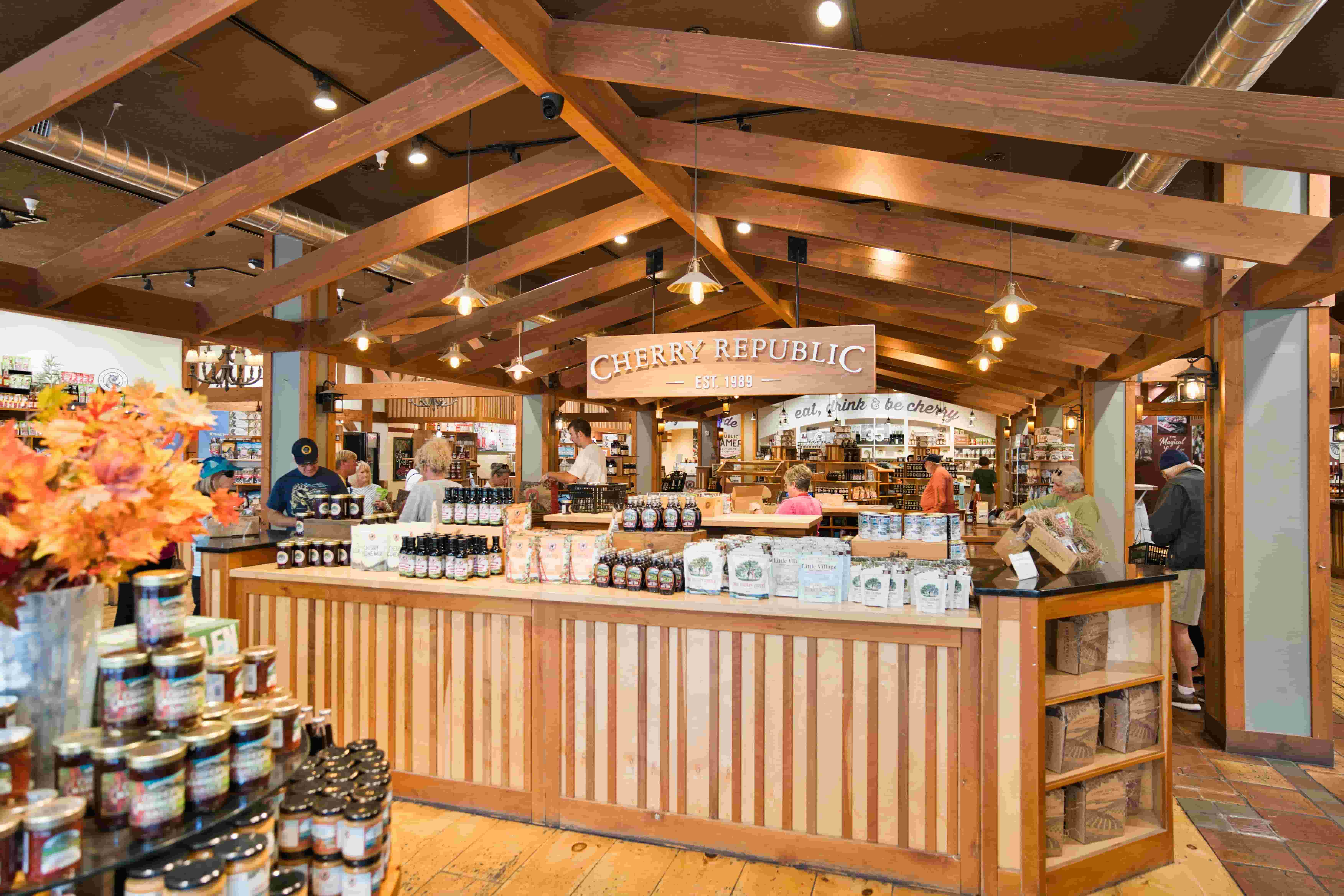 Customers browsing the counter of a specialty retail store